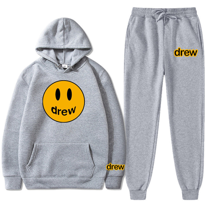 Unisex nan zweiteiliges Lounge-Set aus French-Terry mit Smiley-Print Kapuzenpullover und tapered Jogginghose Echo Archiv