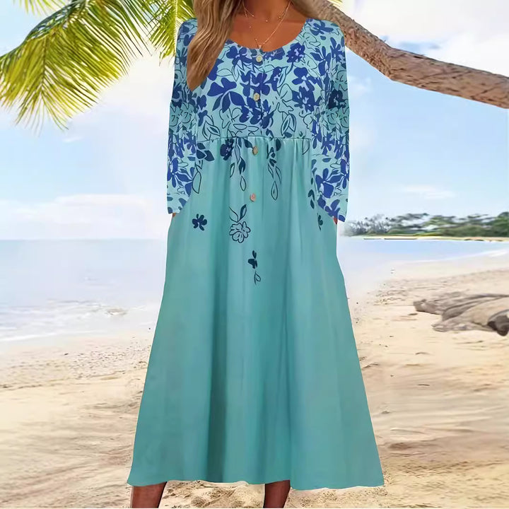 Damen Maxikleid mit V-Ausschnitt, Blumenprint, Knopfleiste und Eingrifftaschen Echoarchiv