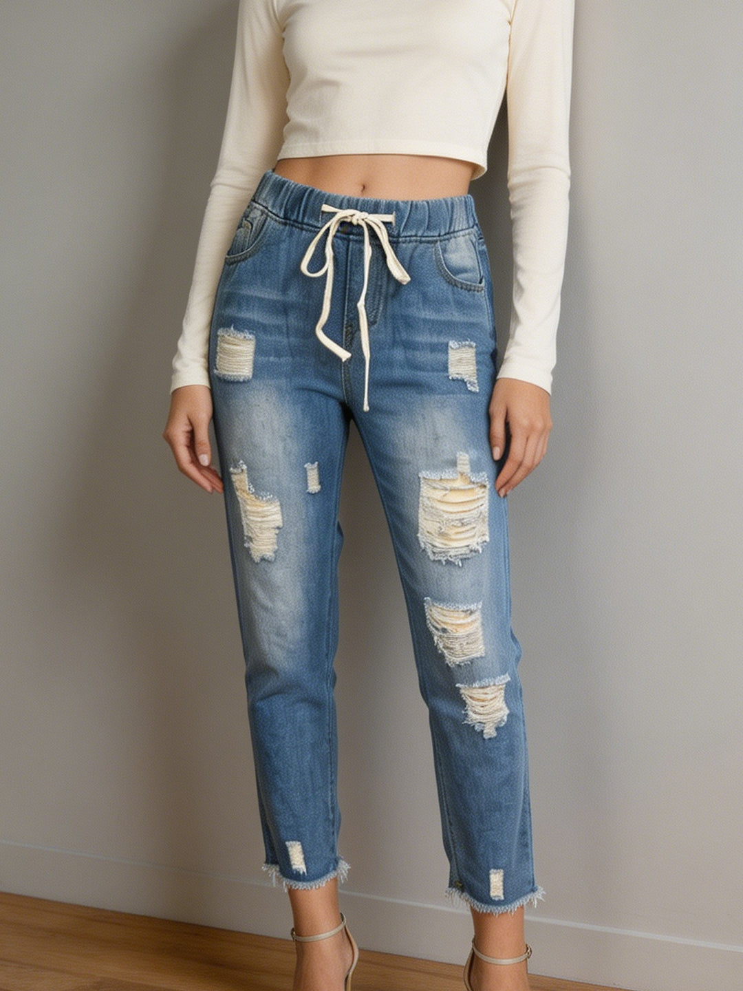 Damen nan lockere Destroyed-Denim Jogger mit elastischem Kordelbund und ausgefranstem Knöchelabschluss Echo Archiv