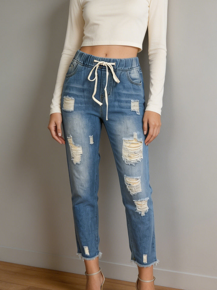 Damen nan lockere Destroyed-Denim Jogger mit elastischem Kordelbund und ausgefranstem Knöchelabschluss Echo Archiv