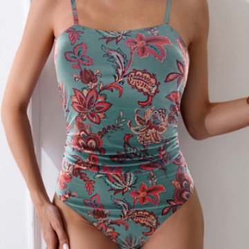 Damen Einteiler Badeanzug mit floralem Raffungselement Echo Archiv