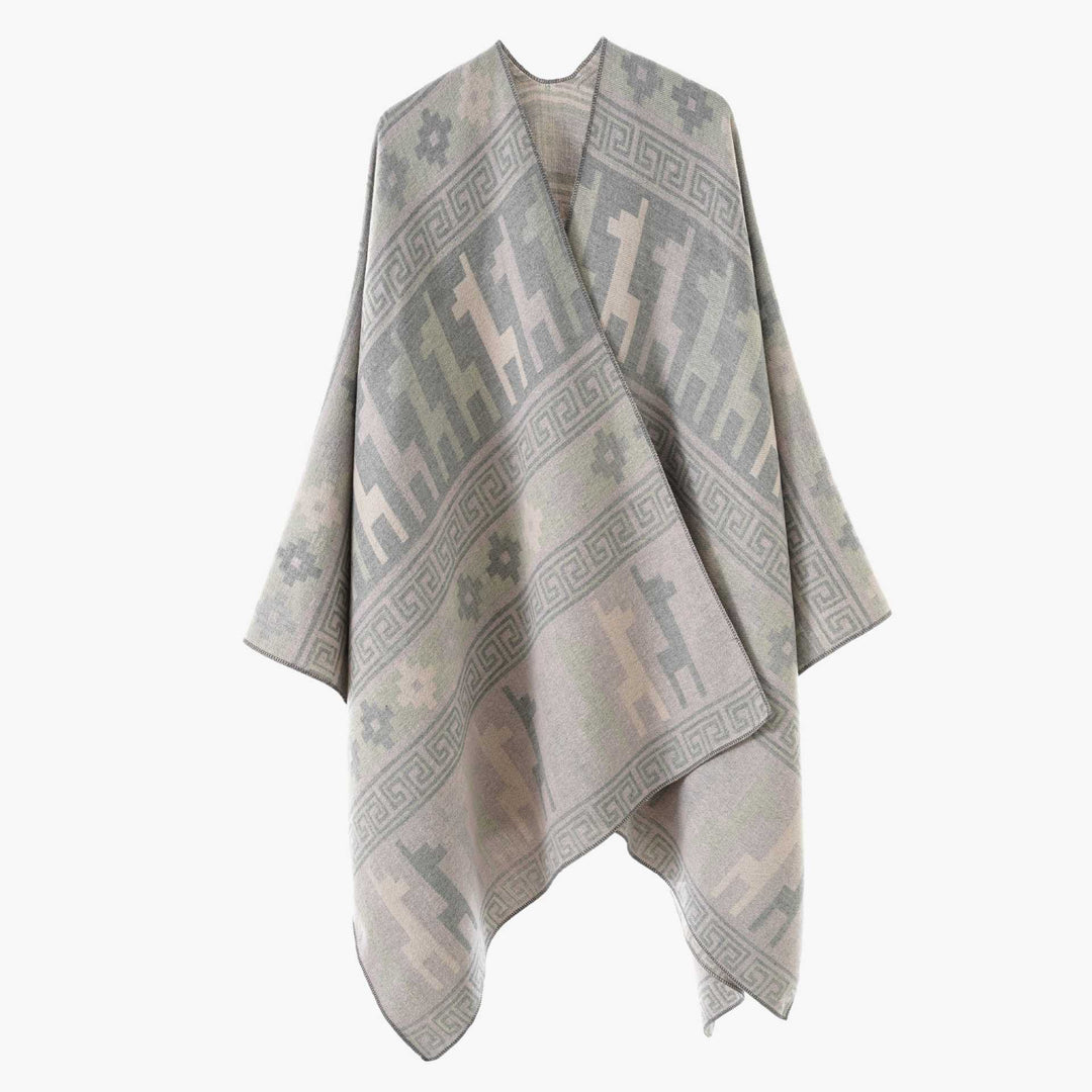 Damen Cape-Überwurf aus Jacquard-Strick mit Tier- und Ethno-Motiv Echo Archiv
