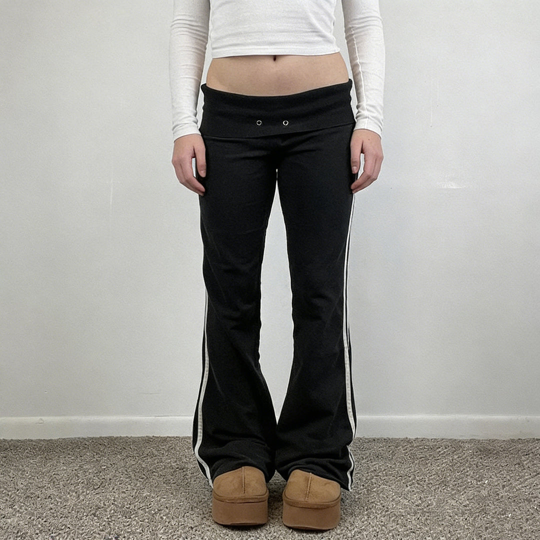 Damen Fließende Palazzo-Hose mit hohem Bund und dekorativen Ösen Echo Archiv