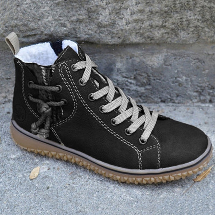 Damen High-Top Sneaker-Boot mit seitlichem Reißverschluss, dekorativem Knöchelriemen und profilierter Gummisohle Echo Archiv