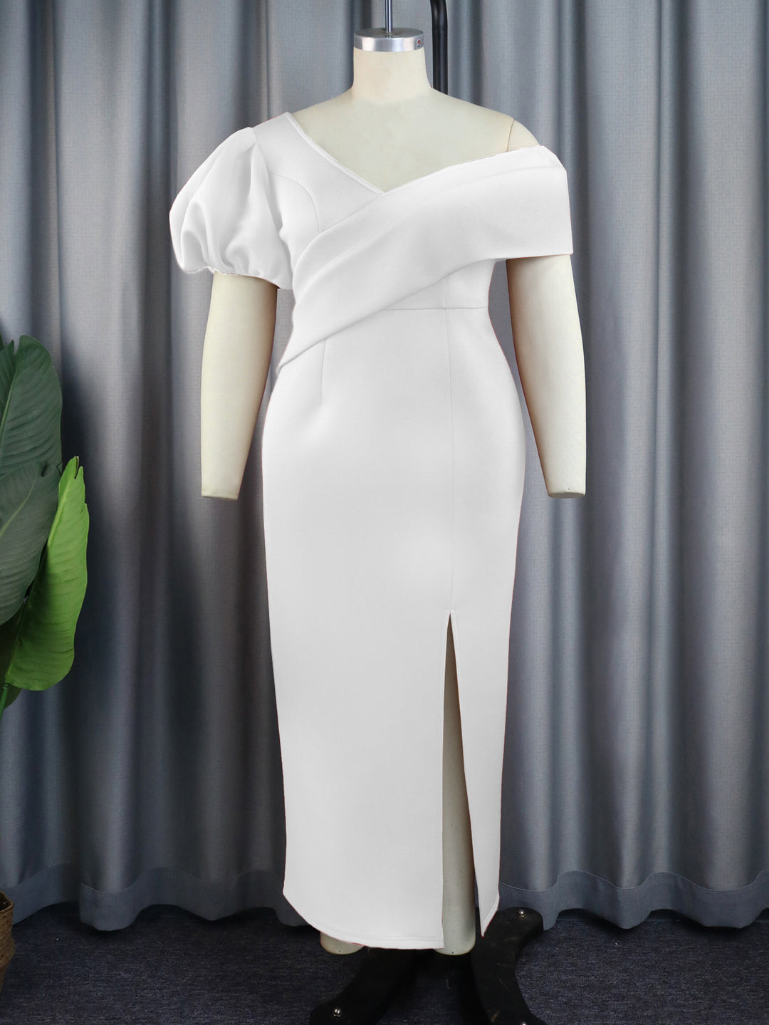 Damen Elegantes Maxikleid mit asymmetrischem Ausschnitt und voluminösen Puffärmeln Echo Archiv
