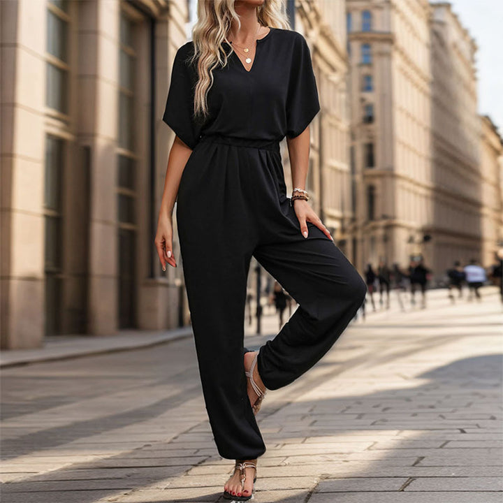 Damen Lässiger Jumpsuit mit Taillen-Smock, kurzem Fledermausärmel und elastischem Knöchelabschluss – Solévia