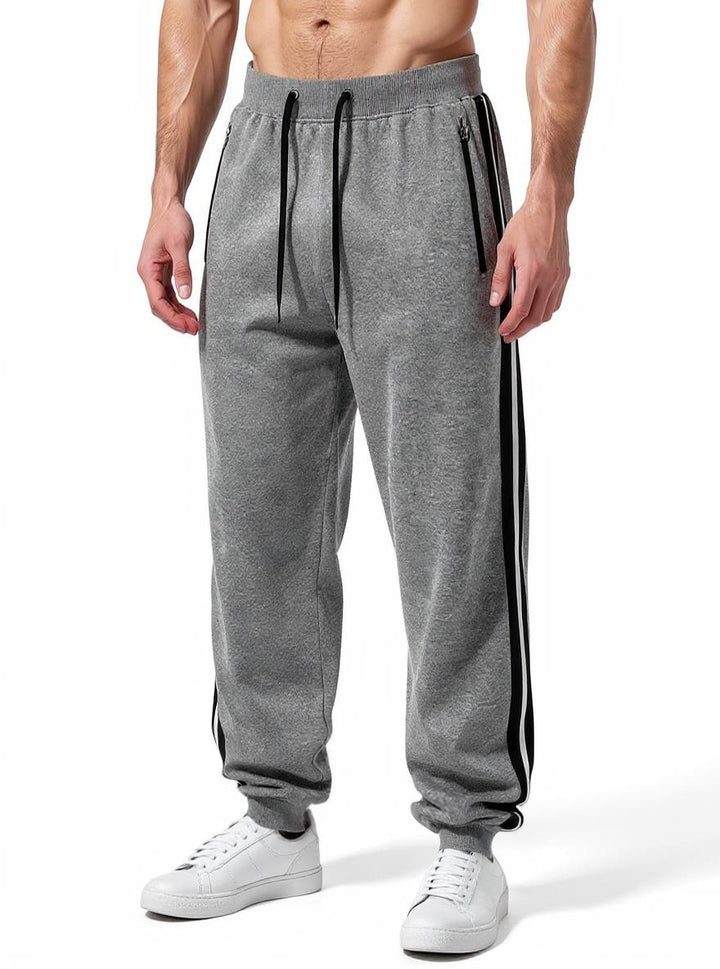 Herren Sportliche Jogginghose mit elastischem Bund und seitlichen Reißverschlusstaschen Echo Archiv