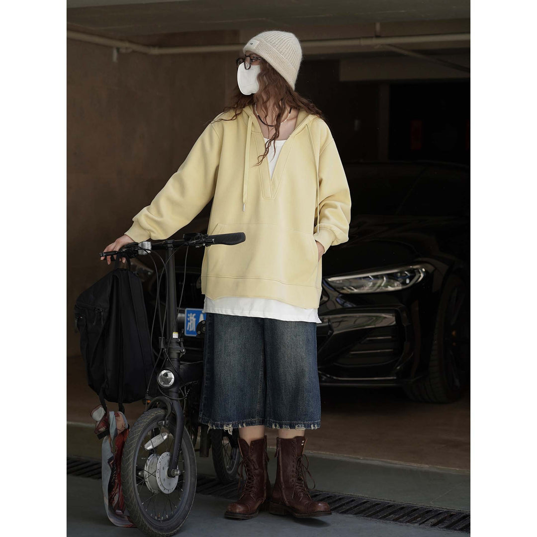 Damen Oversize-Hoodie mit V‑Ausschnitt und Kängurutasche Echoarchiv