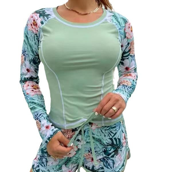 Damen Sportliches Langarm-Badeoberteil mit floralem Design und Shorts Echo Archiv