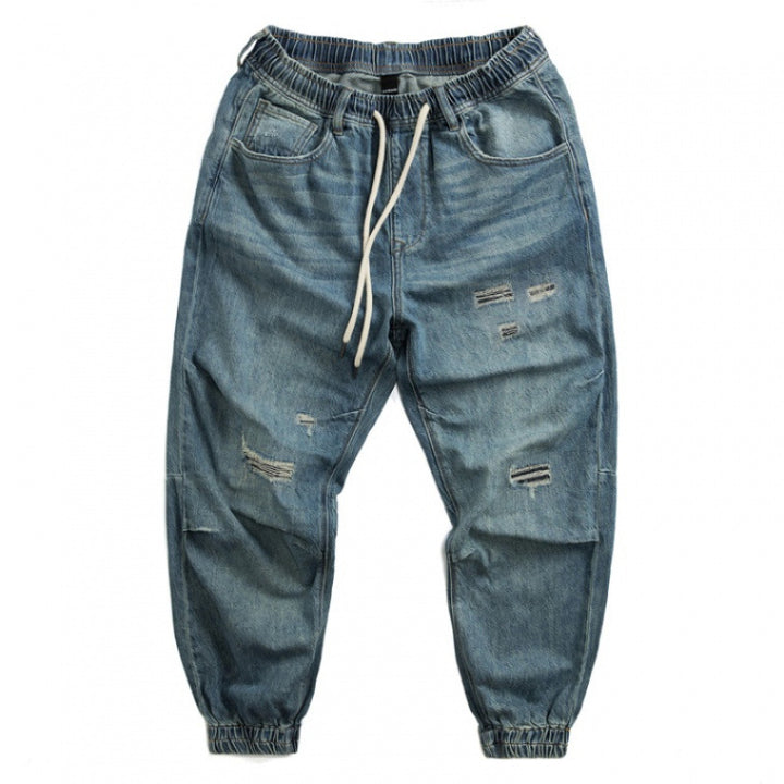Herren lässige Jeans mit modischem Destroyed-Look Echoarchiv