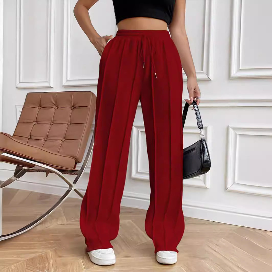 Damen Weite High-Waist Plissee-Hose mit Tunnelzug und markanter Bügelfalte Echoarchiv