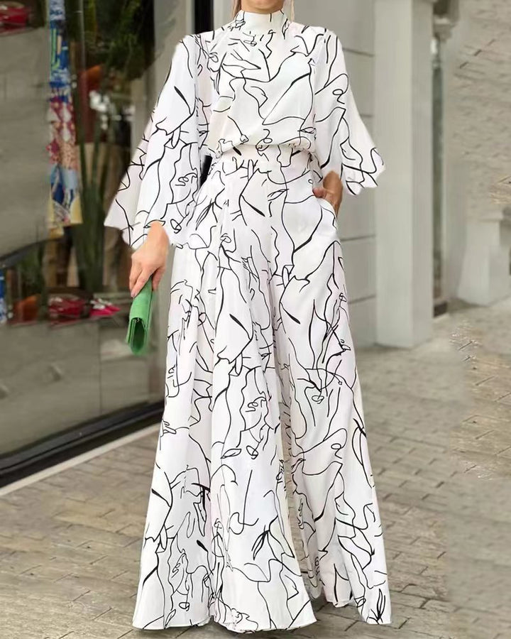 Damen Eleganter Longline Jumpsuit mit Stehkragen, Ballonärmeln und Seitentaschen Echoarchiv