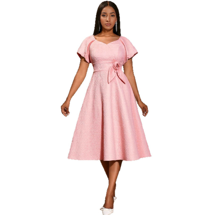 Damen elegantes Kleid mit Schößchen, Blumenapplikation und Puffärmeln Echo Archiv