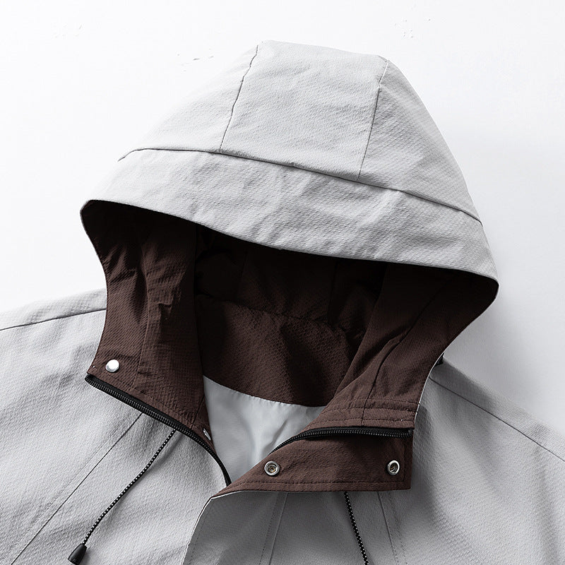 Unisex leichte winddichte Outdoor-Jacke mit Kapuze, wasserabweisende Außenschale und verstellbarem Saum – Taviero