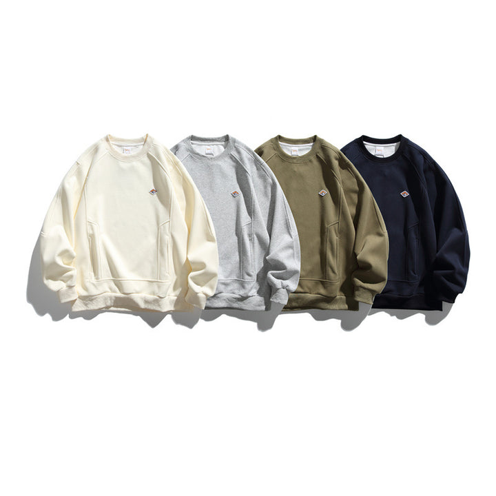 Unisex Oversize-Sweatshirt aus French-Terry mit Raglanärmeln, verdeckten Eingrifftaschen und kleinem Logopatch Echoarchiv