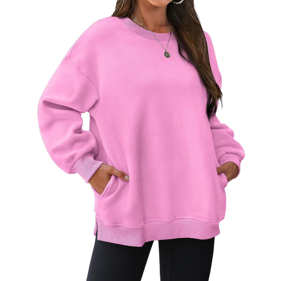Damen verlängertes Oversize Rundhalspullover mit seitlichen Eingrifftaschen, Rippbündchen und überschnittener Schulter – Mavelle