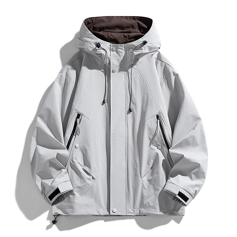 Unisex leichte winddichte Outdoor-Jacke mit Kapuze, wasserabweisende Außenschale und verstellbarem Saum – Taviero