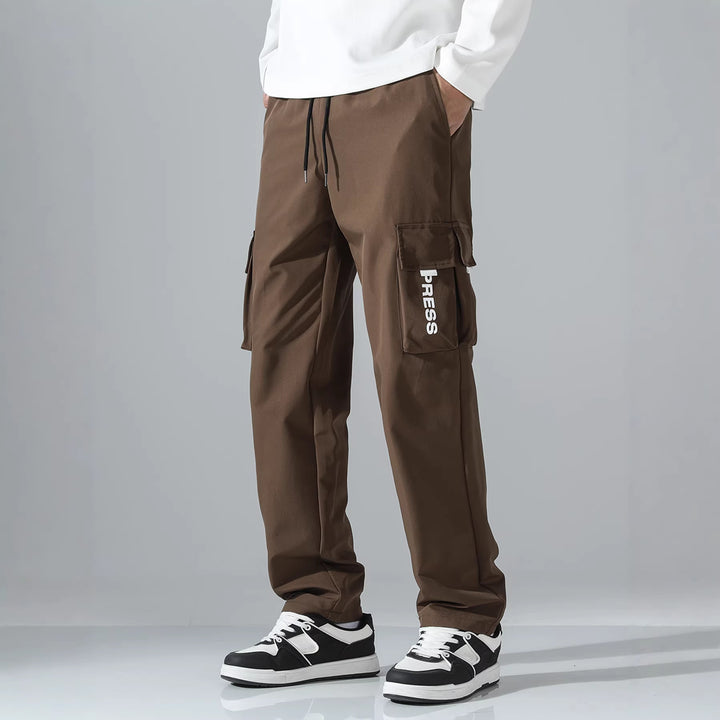 Herren Tapered Cargo-Jogginghose mit elastischem Tunnelzug, multifunktionalen Klapptaschen & ergonomischen Nähten Echo Archiv