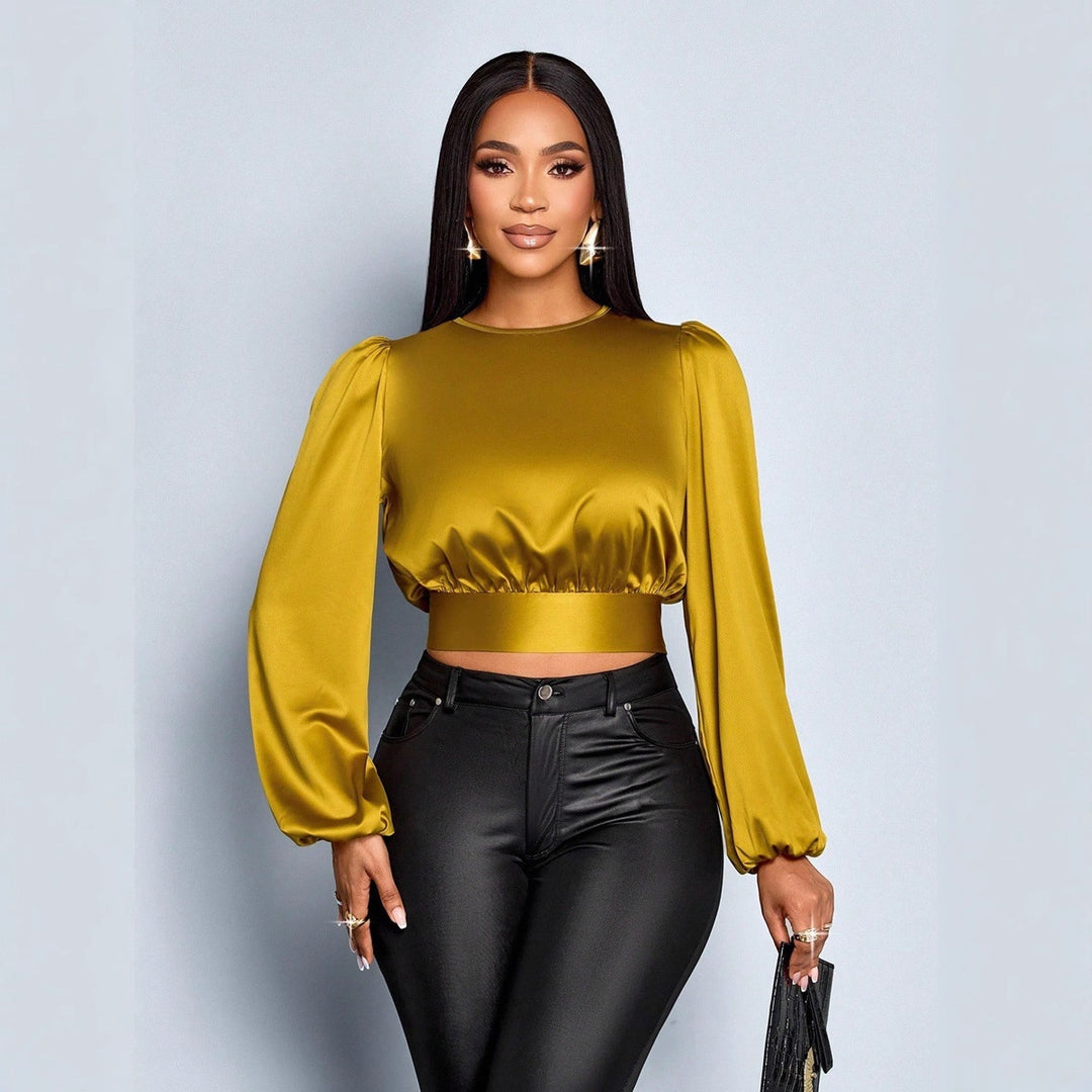 Damen Elegant geschnittene Leoparden-Bluse mit Dekolleté und Schleifenrand Echo Archiv