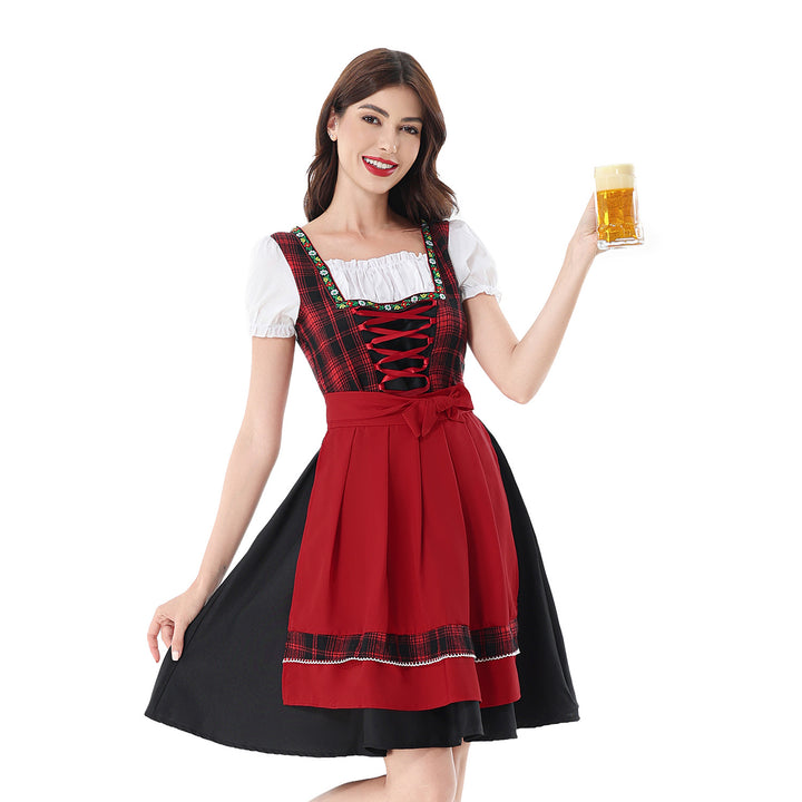 Damen nan traditionelles Dirndlkleid mit kariertem Mieder, Schnürung, Puffärmeln und Schürze Echo Archiv
