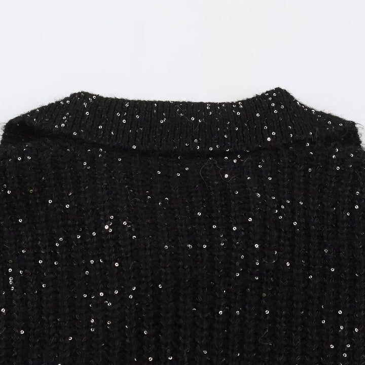 Damen Grobgestrickter Pullover mit weitem Reverskragen und Paillettenbesatz Echoarchiv