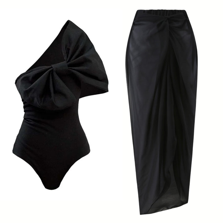 Damen Einschnitt Badeanzug mit voluminösem Schleifen-Detail und elegantem Wickelrock Echo Archiv