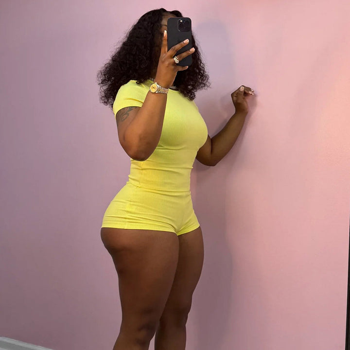 Damen Figurbetontes Jumpsuit mit kurzen Ärmeln und Rippenstruktur Echo Archiv