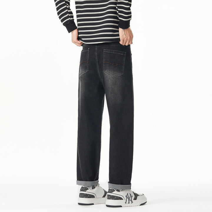 Herren Weite gerade geschnittene Denim-Jeans mit Used‑Wash und Umschlagbund Echoarchiv