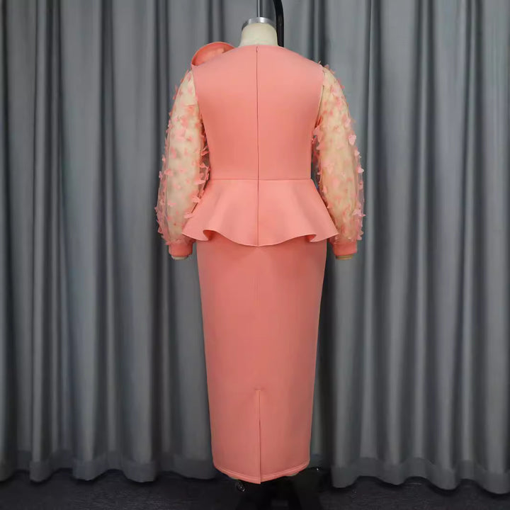 Damen Elegantes Kleid mit extravaganten Puffärmeln und floralem Detail Echo Archiv