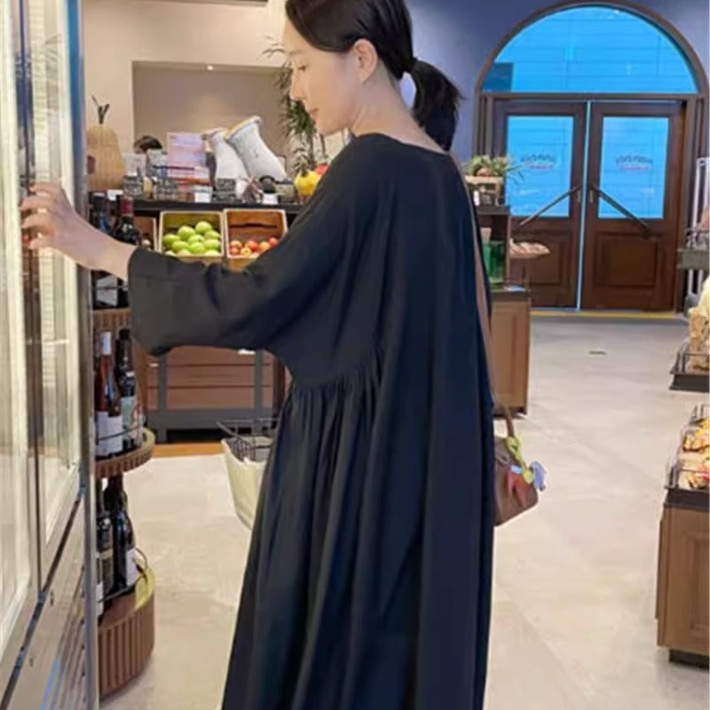 Damen Langes Smock‑Maxikleid mit tiefer Taillennaht und weitem Glockenrock – Valéora