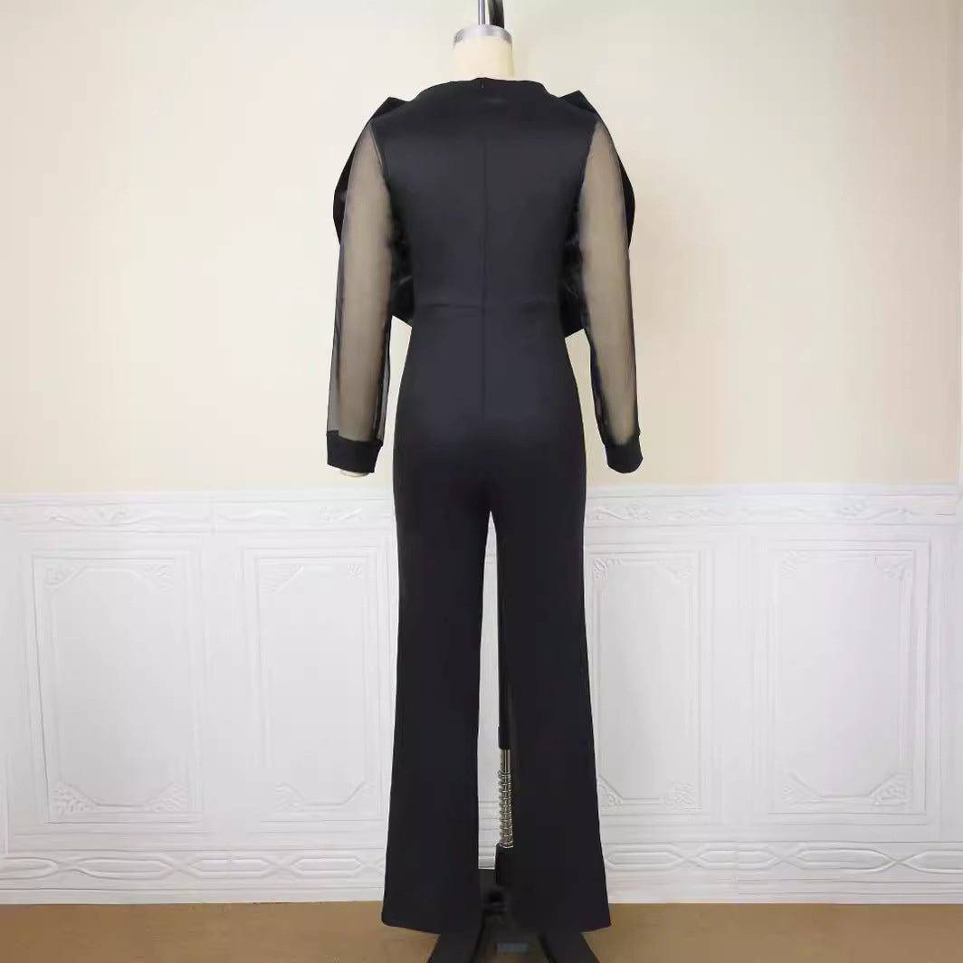 Damen eleganter Jumpsuit mit voluminösem Satinkragen und transparenten Ärmeln Echo Archiv