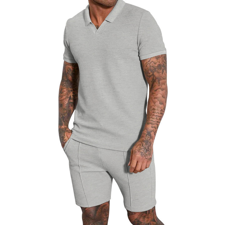 Herren Kurzarm Polohemd mit sportlichem Schnitt und Bundshorts Echoarchiv