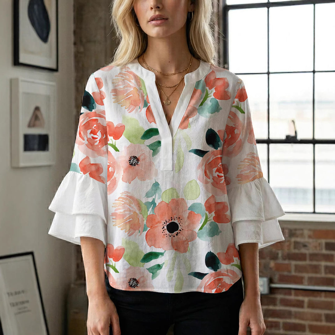 Damen Elegantes Oberteil mit voluminösen Rüchenärmeln und floralem Druck Echo Archiv