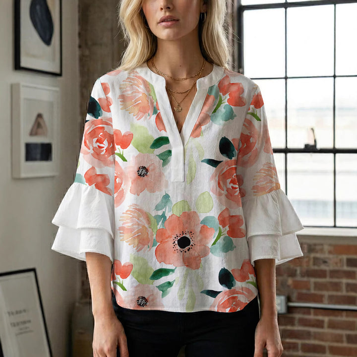 Damen Elegantes Oberteil mit voluminösen Rüchenärmeln und floralem Druck Echo Archiv