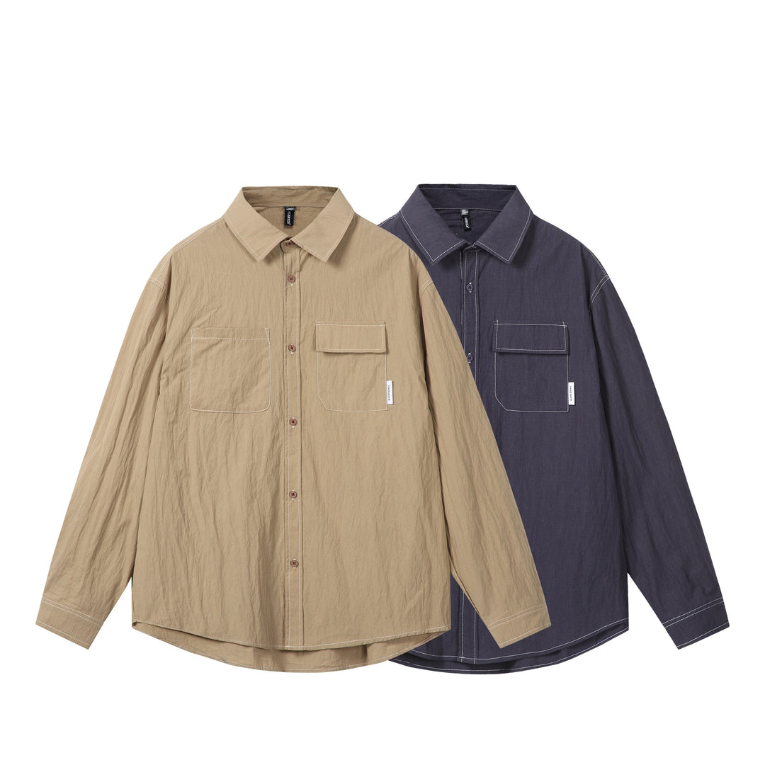 Unisex Oversize-Hemdjacke mit markanten Kontrastnähten und aufgesetzten Brusttaschen Echoarchiv