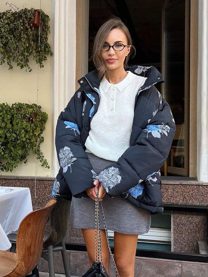 Damen Gepolsterte Oversize-Steppjacke mit Blumenprint und Kapuze Echoarchiv
