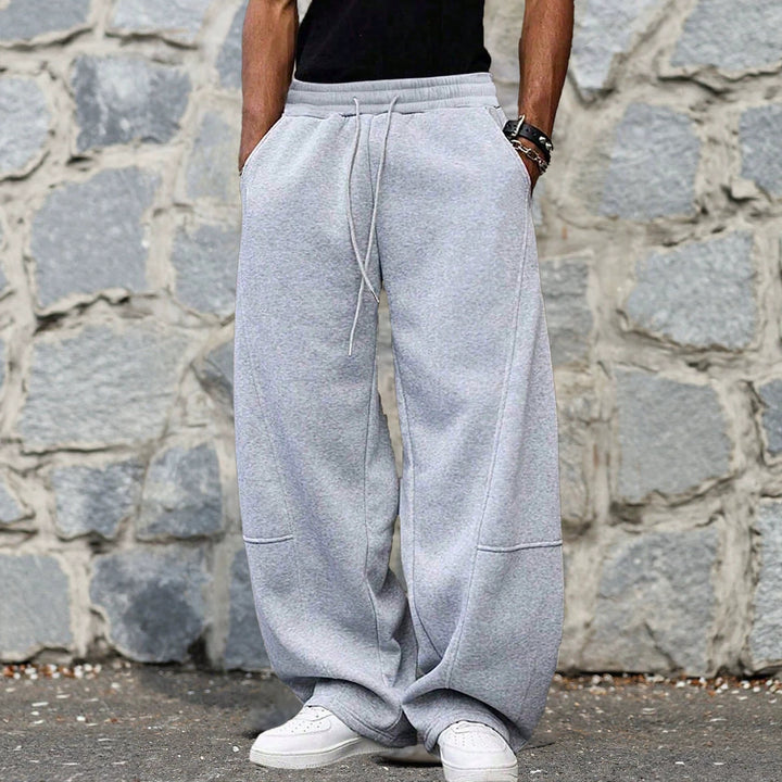 Herren weite Sweatpants im Baggy Cut mit elastischem Bund, Tunnelzug und Eingrifftaschen Echo Archiv