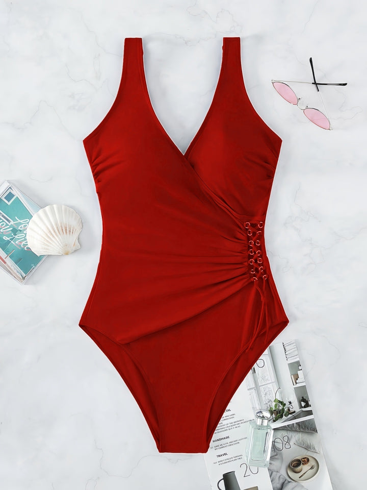 Damen Einteiliger Badeanzug mit raffiniertem Wickeldesign Echo Archiv