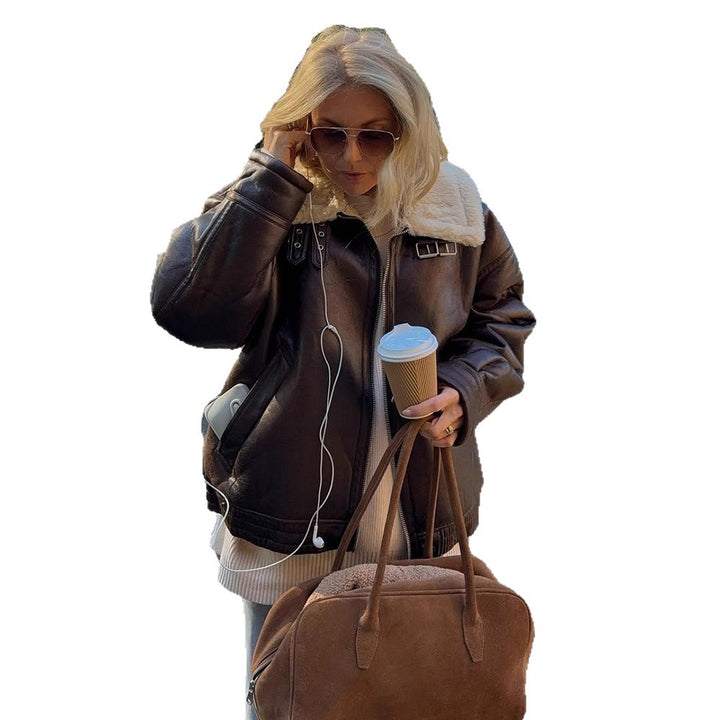 Damen Oversize Fliegerjacke aus Kunstleder mit Teddyfutter und breitem Schnitt Echoarchiv