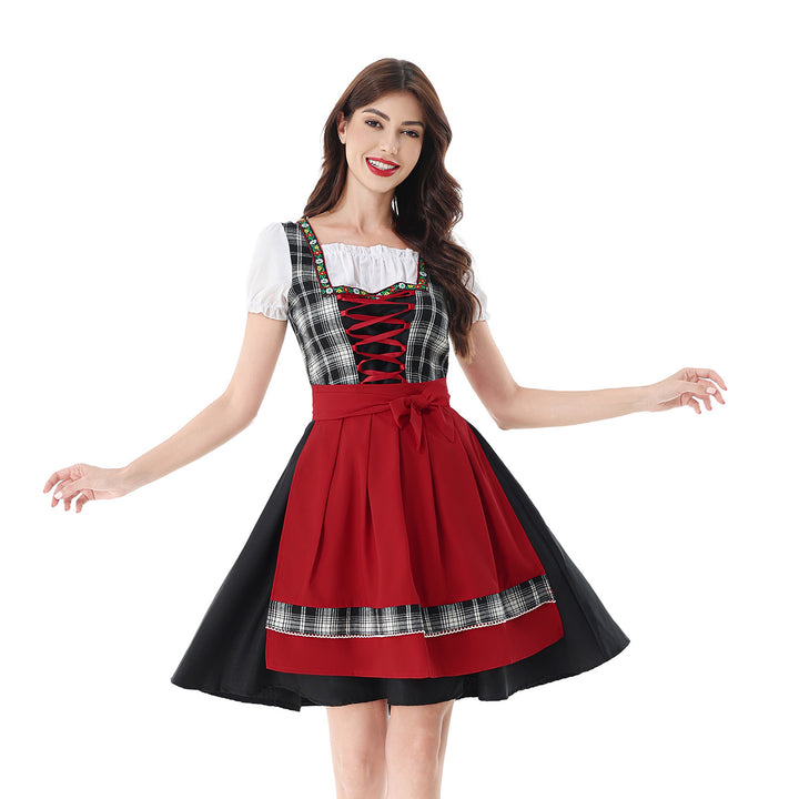 Damen nan traditionelles Dirndlkleid mit Karo-Mieder und gesteppter Schürze Echo Archiv