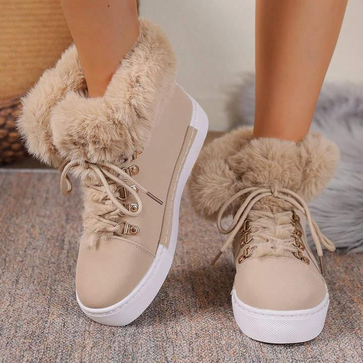 Damen Winterliche Sneaker-Stiefelette mit Kunstfellkragen und Plateau Echoarchiv