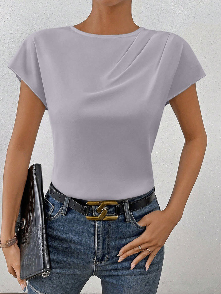 Damen Elegantes Kurzarm-Top mit modernem Schnitt und fließendem Stoff Echo Archiv