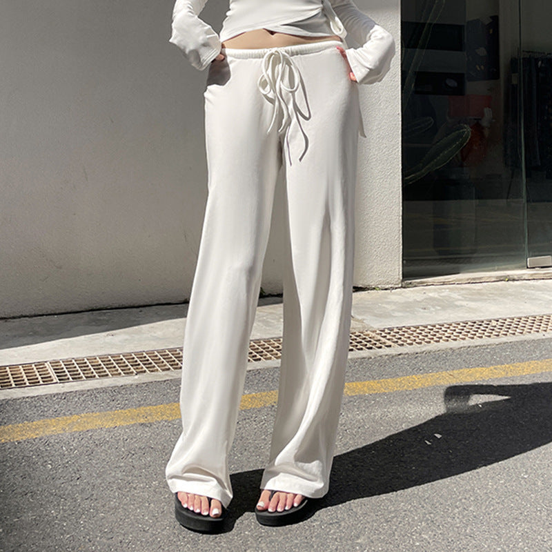 Damen nan Wickel-Cropped-Top mit tiefem V‑Ausschnitt, taillierter Wickelform und langen Glockenärmeln Echo Archiv