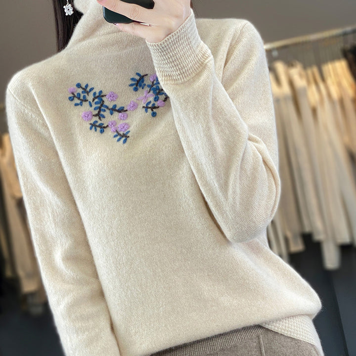 Damen Kaschmir‑Optik Rollkragenpullover mit zarter Blumenstickerei am Brustbereich Echoarchiv