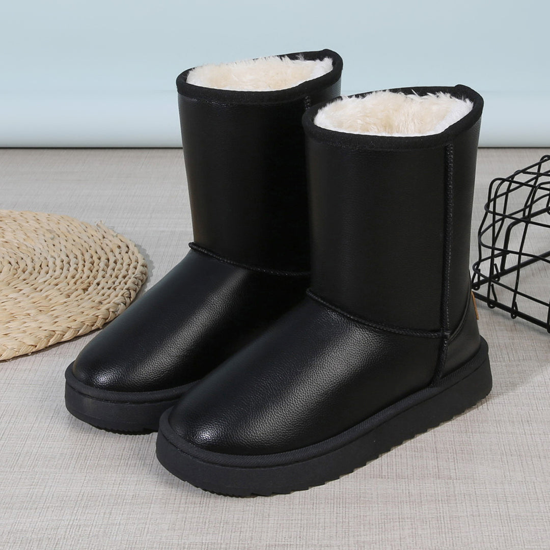 Damen Winterstiefel mit Teddyfutter, Lederoptik und flacher Plateau‑Sohle Echoarchiv