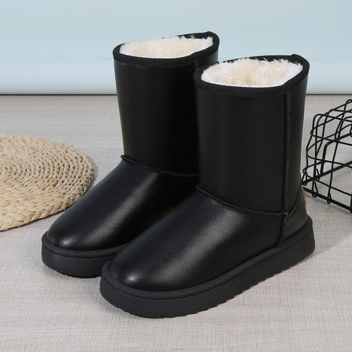 Damen Winterstiefel mit Teddyfutter, Lederoptik und flacher Plateau‑Sohle Echoarchiv