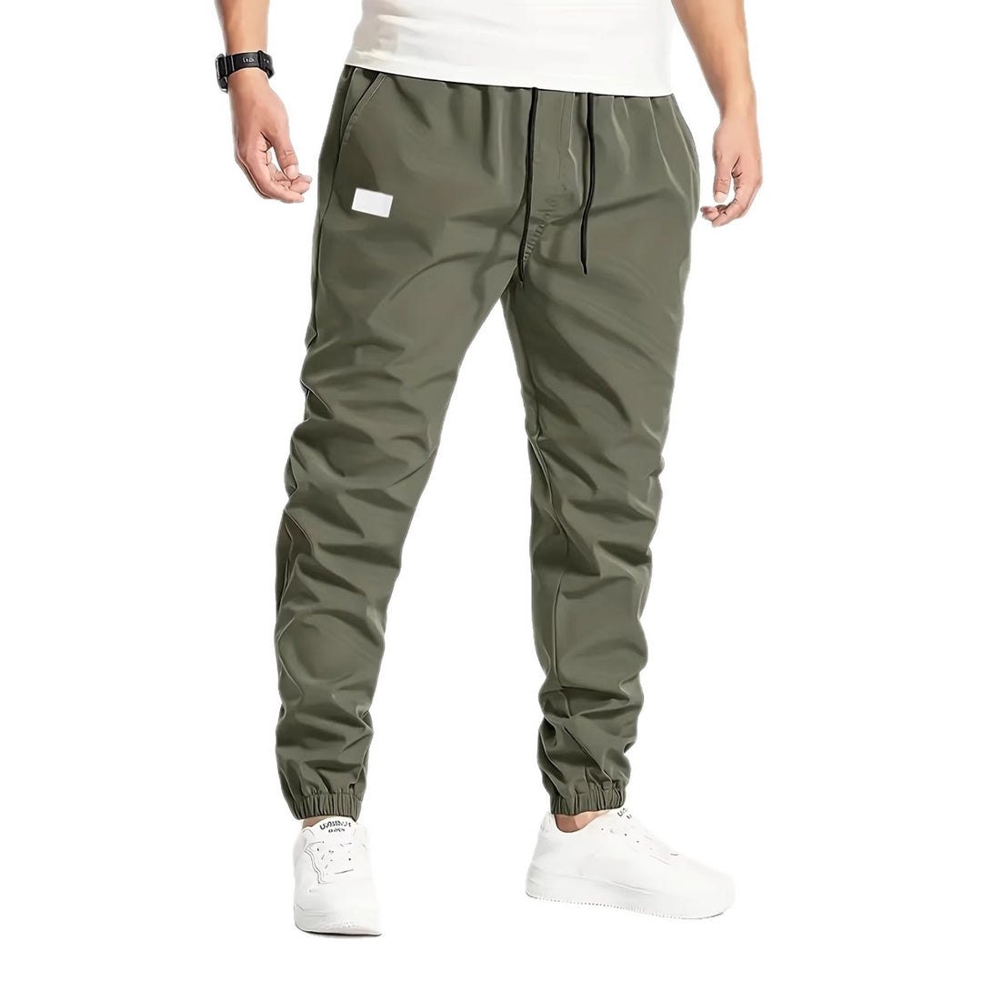 Herren Technische Jogginghose im Tapered‑Utility‑Stil mit elastischem Bund & Knöchelbündchen Echo Archiv