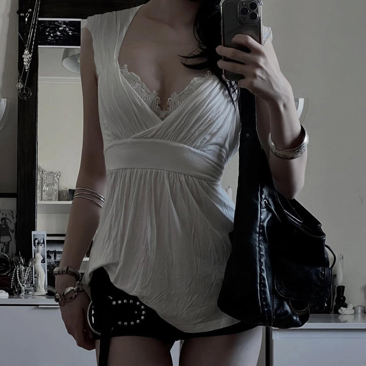 Damenkleid mit raffinierter Spitzenapplikation und weich fließendem Stoff Echo Archiv