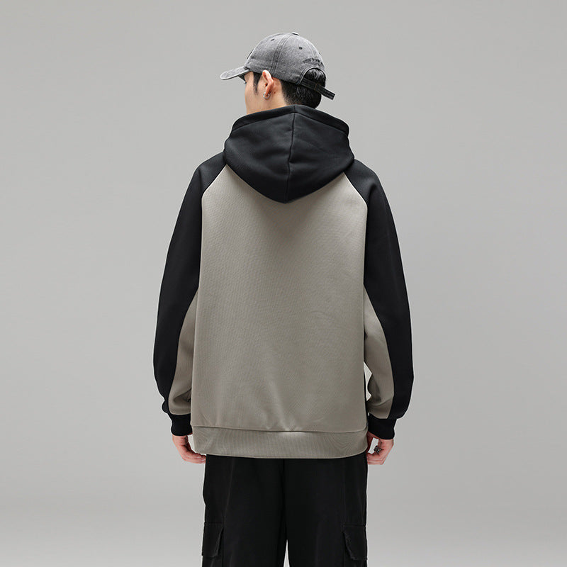 Herren Kapuzenpullover im Colourblock-Design mit Raglanärmeln, Kängurutasche und geripptem Saum Echo Archiv