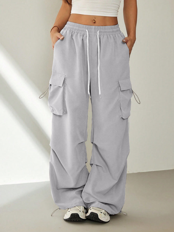Damen Weite Cargo‑Loungehose mit Gummibund, Tunnelzug und großen Klappentaschen – Avérine